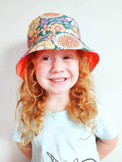 Yoho Baby & co. | Hand made by a Kiwi Mumma bucket hats for babies. Orange Blooms print