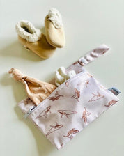 Yoho Baby & co. NZ Wet bags in 4 convenient sizes, for babies daycare, swim nappy, cloth nappies, snacks, breast pads and so much more! Toffee Whales Print